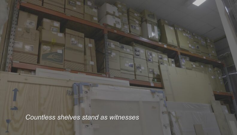 A still from Noor Abuarafeh's The Moon Returns as a Ghost. Numerous boxes across shelves, with the subtitle "Countless shelves stand as witnesses"